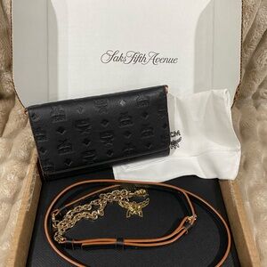 MCM Black and Gold Crossbody with Chain Detail